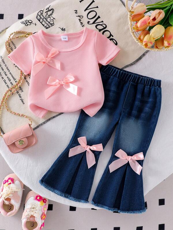 2pcs Baby Girl Sweet Casual Set: 3D Bow Decor Round Neck Short Sleeve T-Shirt Top And 3D Pink Bow Decor Slim Flare Leg Frayed Hem Denim Pants Outfit
