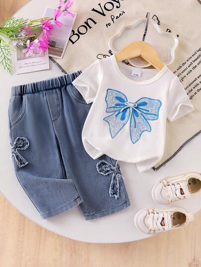 Conjunto de 2 piezas para niña bebé con top de manga corta de cuello redondo con estampado de lazo minimalista y pantalones vaqueros rectos holgados con bordado de lazo