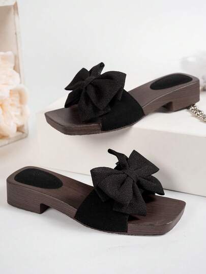 Damslip-on med rosettdekor och fyrkantig tå, söt stil, låg klack i svart konstmocka, lämplig för vardagsbruk, vår/sommar