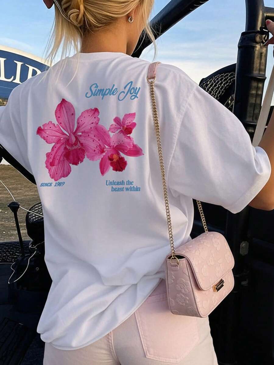 This Colorful Letter & Floral Print Round Neck T-Shirt For Women Is Fashionable And Versatile. Graphic Tee, White Top, Pink Top, Suitable For Vacation Wear. - White - View 1