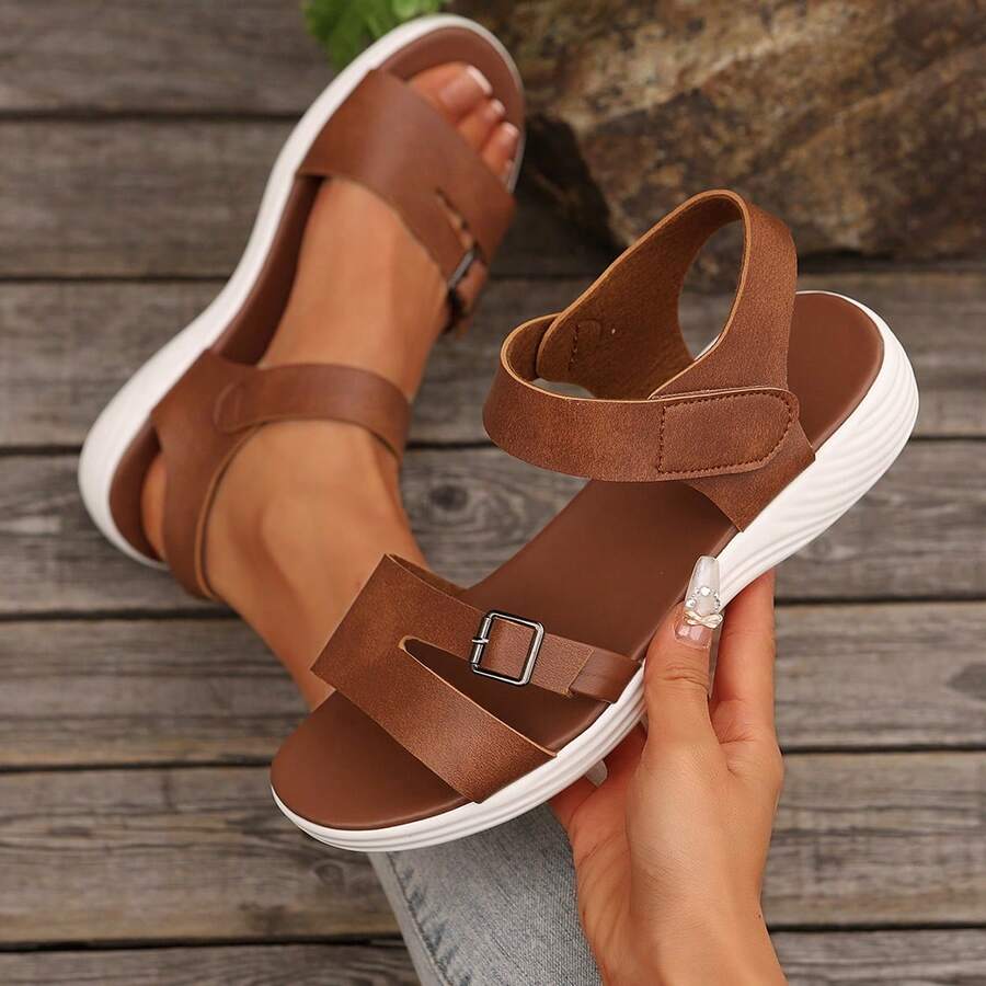 Simple Soft Bottom Sandals For Women, New Fashion Roman Style Student Flat Sandals, Plus Size Solid Color Buckle Daily Wear Asymmetric Hollow Design Sandals - Mocha Brown - View 1