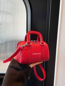 这款全新迷你圆筒手套斜挎包造型精美，复古时尚，休闲简约又不失优雅。它采用拉链设计和可调节肩带，非常适合青少年、购物和旅行使用。这款包包容量充足，可轻松收纳日常必需品，是一款百搭时尚单品。它风格百搭，适合各种场合。 - 簡約圓筒手提包 - 查看 16