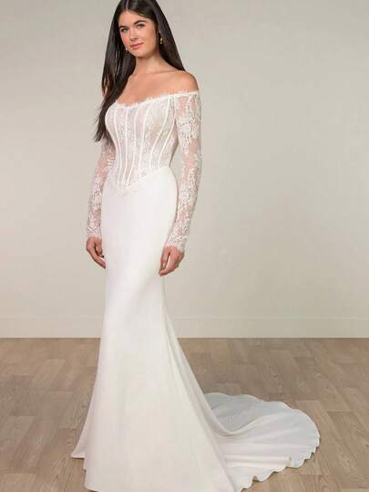 This Enchanting Gown Blends Timeless Elegance With Modern Sophistication. The Fitted Sweetheart Bodice Is Adorned With Delicate Lace And Couture-Inspired Exposed Boning For Structure And Refinement. Sheer Lace Long Sleeves Frame The Neckline And Shoulders With Intricate Detail, Adding An Ethereal Touch. The Flowing Stretch Crepe Skirt The Figure, Cascading Into A Graceful Train, Offering A Stunning Contrast Of Textures. Perfect For Weddings, Holiday Events Like Christmas And Halloween, Proms, Or Birthday Parties. Available In Plus Sizes For A Flawless Fit.