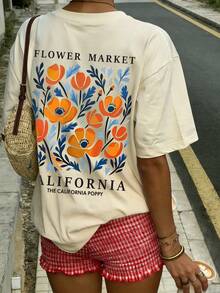 Camiseta de manga corta de cuello redondo con estampado floral naranja y azul de California, de diseño de moda y versátil para mujer