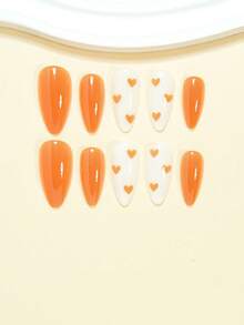 24片杏仁形美甲贴纸，简约浪漫，橙色爱心图案，全覆盖设计，为女性和女孩增添一丝浪漫气息。包含1张贴纸和1支迷你美甲胶水，适合日常办公佩戴。果冻美甲胶水随机发货。美甲用品 - 彩色 - 查看 4