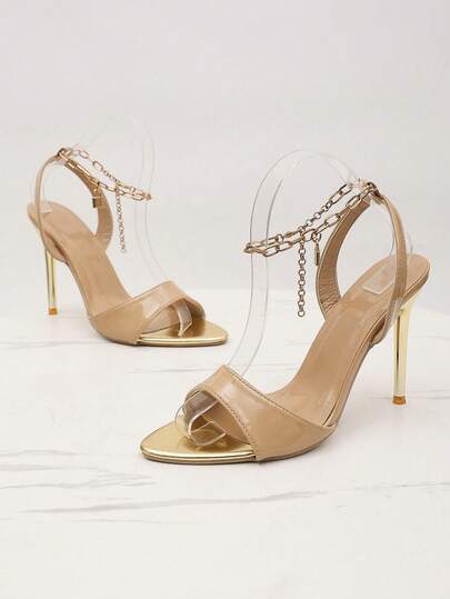 Giày sandal cao gót mỏng có khóa cài thời trang nữ, sandal dây xích vàng sành điệu, giày cao gót mỏng thanh lịch dự tiệc, sandal cao gót mỏng màu vàng trang trí khóa cài duyên dáng dự tiệc.