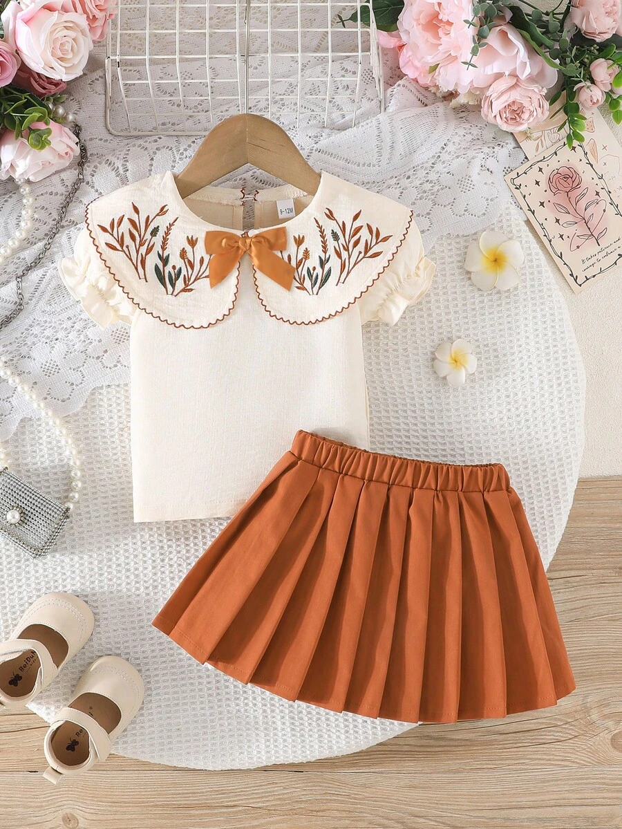 Conjunto de blusa con mangas con volantes y falda plisada con bordado floral elegante para niñas pequeñas - Caqui - Ver 1