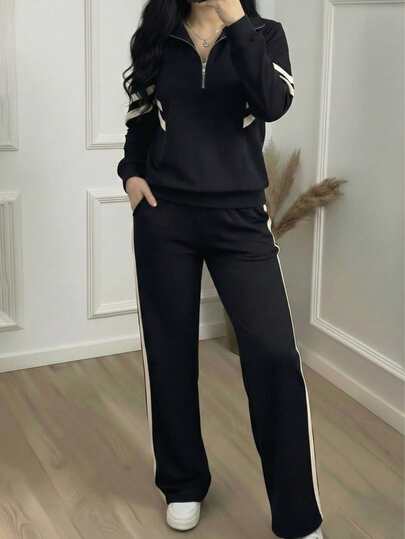 女士休闲套装，优雅运动装，领口拉链宽松条纹撞色上衣搭配阔腿裤，适合春、秋、冬季穿着。