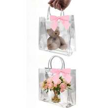20 túi quà bằng nhựa trong suốt có quai xách và nơ đỏ - Túi đựng quà bằng PVC trong suốt có thể tái sử dụng cho đám cưới, họp mặt bạn bè, tiệc sinh nhật. - Trong sáng - Xem 21