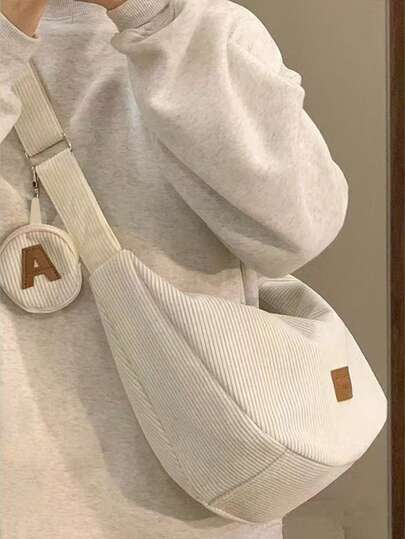 现货！2025新款女士灯芯绒饺子包 - 大容量休闲百搭斜挎/单肩包。理想的情人节礼物，日常通勤的完美之选。批发供应，限时特价，超值之选！女士必备包包！