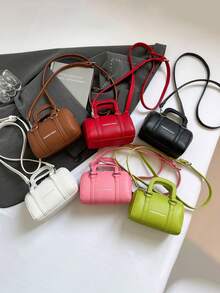 这款全新迷你圆筒手套斜挎包造型精美，复古时尚，休闲简约又不失优雅。它采用拉链设计和可调节肩带，非常适合青少年、购物和旅行使用。这款包包容量充足，可轻松收纳日常必需品，是一款百搭时尚单品。它风格百搭，适合各种场合。 - 簡約圓筒手提包 - 查看 1