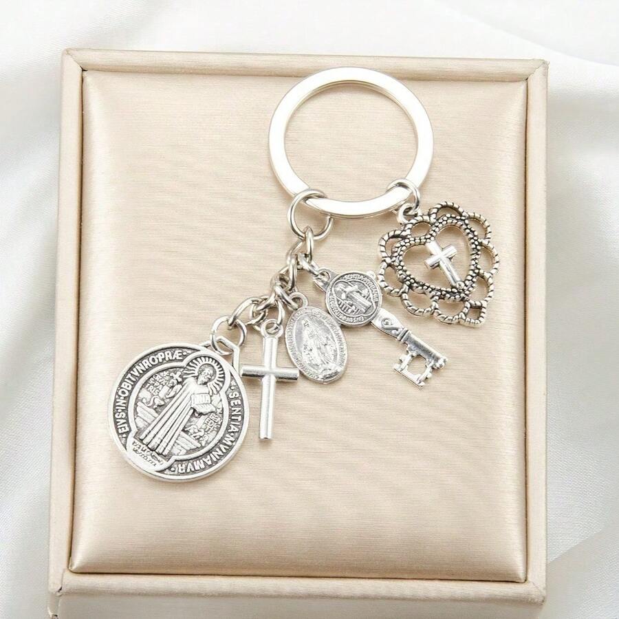 One Religious Novelty Keychain, A Circular Keychain With Multiple Accessories Assembled Together. The Keychain Of Saint Benedict And The Virgin Mary Cross, A Religious Prayer Protection Keychain Pendant, Can Be Used For Packaging, Decorating Mobile Phones, And Is A Beautiful Creative Gift. - 1 - Xem 1