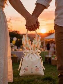 1个可爱复活节兔子抽绳袋，带兔耳朵，适合装复活节礼物、派对小礼品和纪念品。可装鸡蛋和胡萝卜，非常适合用作复活节彩蛋寻宝奖品、派对小礼品袋、节日礼物包装或家庭聚会零食收纳袋。 - 彩色 - 查看 6