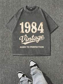 1984 Vintage Oversized T-Shirt - Aged To Perfection Stone-Washed Retro Distressed Black Tee With Vintage Print, Unisex Loose Fit Casual Streetwear For Men & Women, All-Season Comfort, Durable Hot Transfer Graphic - Xám - Xem 1