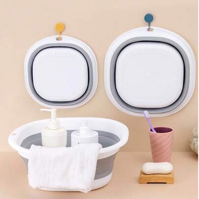 时尚可折叠洗脸盆，方便居家洁面，多种尺寸可选。多功能设计，可用于洗脚、洗衣服、洗蔬菜等。可折叠设计，方便收纳。适合宿舍、学生、旅行和居家使用，采用可压缩塑料材质。