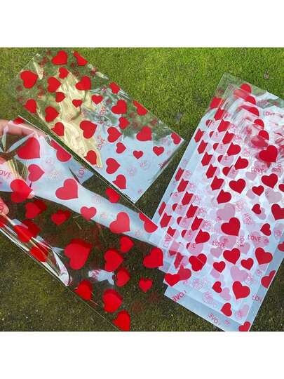 50 piezas Bolsas de regalo con estampado de corazón rojo y cinta dorada - Bolsas de plástico OPP transparentes, adecuadas para el Día de San Valentín, regalos para parejas románticas, decoración de fiestas con tema de fantasía, bolsas de regalo románticas | Diseño de corazón | Bolsas de plástico, decoración del Día de San Valentín, decoración de habitación