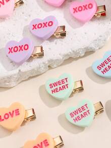 12个彩色闪亮树脂发夹，造型包括英文字母、心形和LOVE字样，时尚百搭，适合日常、情人节、派对等场合，可作发夹、发卡、发夹、头饰等使用。 - 彩色 - 查看 4