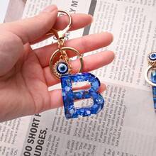 1 chiếc móc khóa màu xanh hải quân thanh lịch với 26 chữ cái tiếng Anh, mặt dây chuyền hình mắt quỷ, thích hợp cho việc đi làm, đi chơi, giữ chìa khóa xe, chìa khóa nhà để tránh bị mất. - Nhiều màu - Xem 3