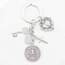 One Religious Novelty Keychain, A Circular Keychain With Multiple Accessories Assembled Together. The Keychain Of Saint Benedict And The Virgin Mary Cross, A Religious Prayer Protection Keychain Pendant, Can Be Used For Packaging, Decorating Mobile Phones, And Is A Beautiful Creative Gift. - 1 - Xem 10