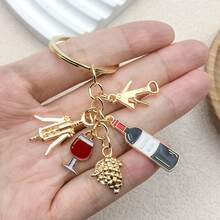 1 葡萄酒开瓶器、葡萄酒瓶起子、葡萄吊坠、钥匙扣、个性化创意钥匙扣、独特手机链、汽车钥匙扣、音乐节爱好者礼物、爱人礼物、汽车吊坠、背包吊坠、手提包吊坠，适合返校季礼物。 - 金色 - 查看 4