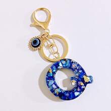 1 chiếc móc khóa màu xanh hải quân thanh lịch với 26 chữ cái tiếng Anh, mặt dây chuyền hình mắt quỷ, thích hợp cho việc đi làm, đi chơi, giữ chìa khóa xe, chìa khóa nhà để tránh bị mất. - Nhiều màu - Xem 29