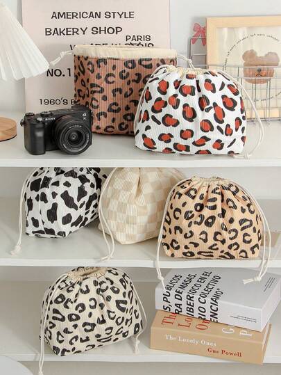 豹纹灯芯绒相机收纳包，大容量抽绳相机包，相机保护包，时尚豹纹抽绳收纳包，多功能收纳包，柔软面料化妆品收纳包，大容量化妆品收纳包，便携式相机包，便携式化妆包，家居用品收纳包