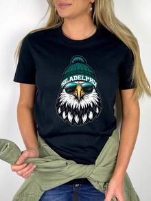 May Include  T-Shirt Featuring A Graphic Of An Eagle Wearing A Gr (2) - Black - View 1