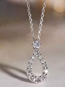1件S925纯银镂空水滴形吊坠项链，镶嵌合成锆石，优雅波西米亚风格，适合女性日常佩戴