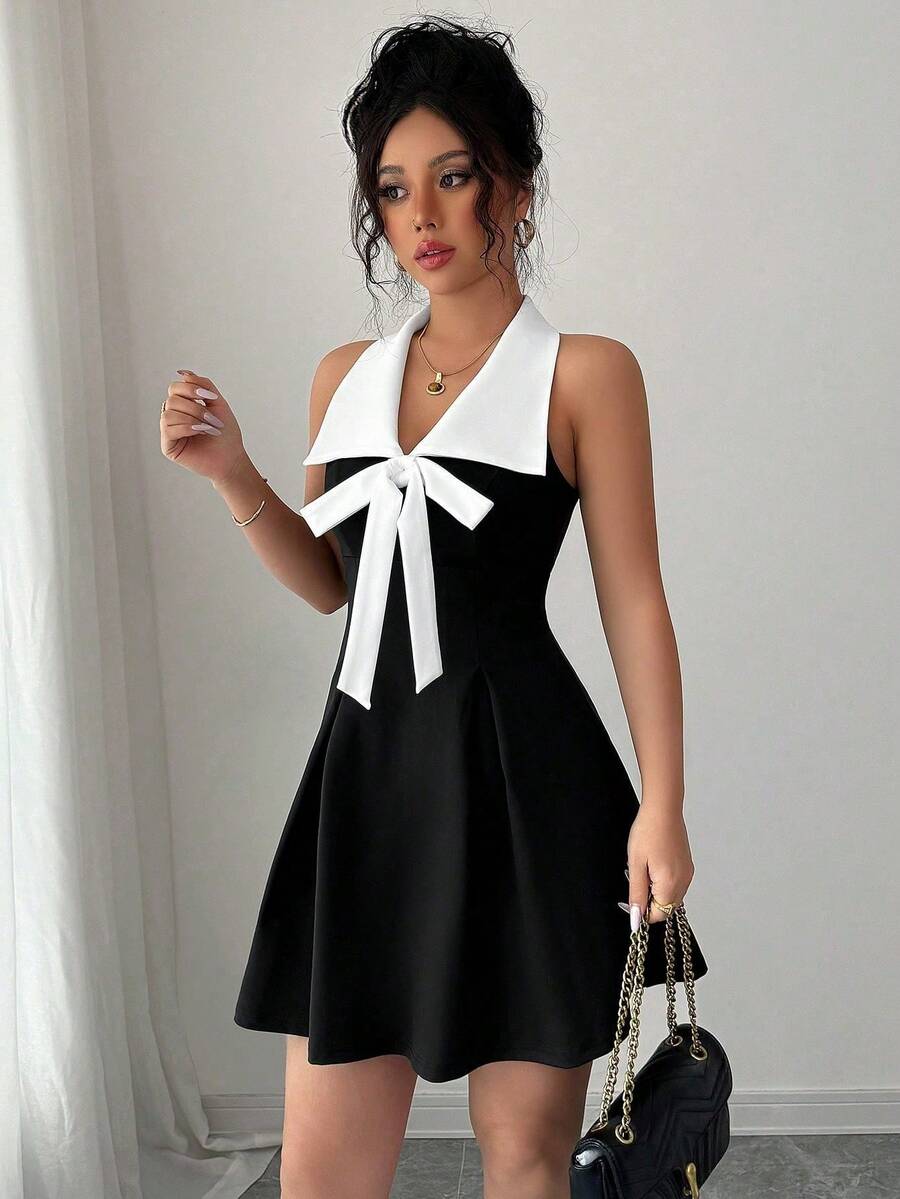 黑白撞色性感翻领V领无袖A字连衣裙，领口饰有蝴蝶结，优雅通勤休闲时尚，适合生日派对、毕业派对、下午茶聚会和旅行等场合，辣妹风春夏新款女装 - 黑與白 - 查看 1