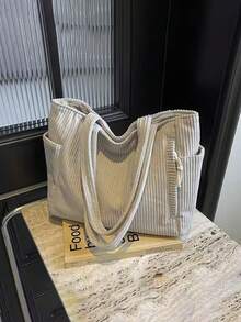 大容量时尚女士单肩手提包，采用柔软耐用的灯芯绒面料，配有侧袋和多个隔层，拉链封口，适合短途旅行、通勤、日常使用，也是情人节礼物的理想之选。 - 彩色 - 查看 15