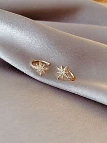 1 par de pendientes con forma de estrella de estilo de tachuelas sin perforación, accesorios de pendientes de clip elegantes y refinados, adecuados para el uso diario de las mujeres y como regalo festivo. - Dorado - Ver 2