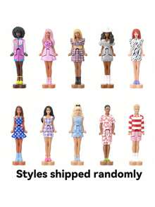 Mattel دمى باربي صغيرة من أرض باربي فاشونيستا، دمى صغيرة بحجم 1.5 بوصة في علبة مكياج، كشف مفاجئ (قد تختلف الأنماط)، JFY13 - متعدد الألوان - مشاهدة 2
