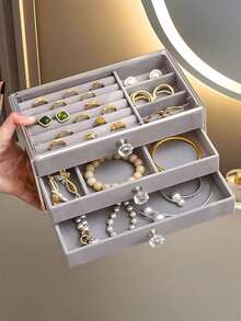 1个三层透明塑料绒布抽屉首饰收纳盒，可整理戒指、项链、手镯、耳环和吊坠，配有水晶形旋钮的优雅展示架，豪华三层首饰收纳盒 - 灰色 - 查看 3