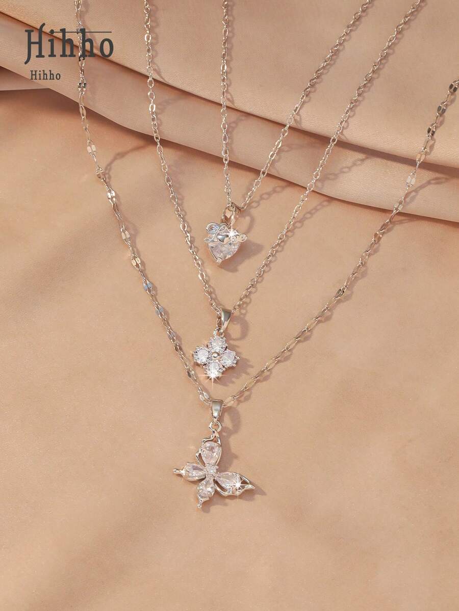 Hihho Bộ 3 dây chuyền nhiều lớp, nhiều họa tiết, mặt dây chuyền hình trái tim, cỏ ba lá, bướm với chữ LOVE, thích hợp để đeo hàng ngày, hẹn hò, ngày lễ, quà tặng ngày Valentine.
