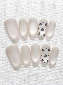 10pcs Handmade Oval-Shaped Nail Stickers, Soft Cream White Matte Finish, With Hand-Painted Light Brown Leopard Print Pattern. Gentle And Elegant Nail Decals Suitable For Ladies And Girls To Use In Spring, Summer, Autumn And Winter Festivals, Parties And Daily Life. - White - View 1