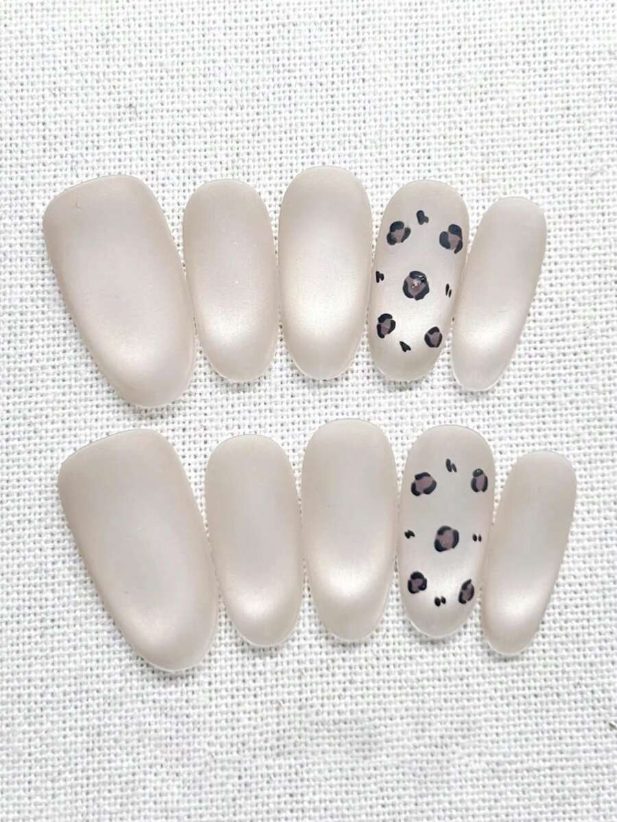 10pcs Handmade Oval-Shaped Nail Stickers, Soft Cream White Matte Finish, With Hand-Painted Light Brown Leopard Print Pattern. Gentle And Elegant Nail Decals Suitable For Ladies And Girls To Use In Spring, Summer, Autumn And Winter Festivals, Parties And Daily Life. - White - View 1