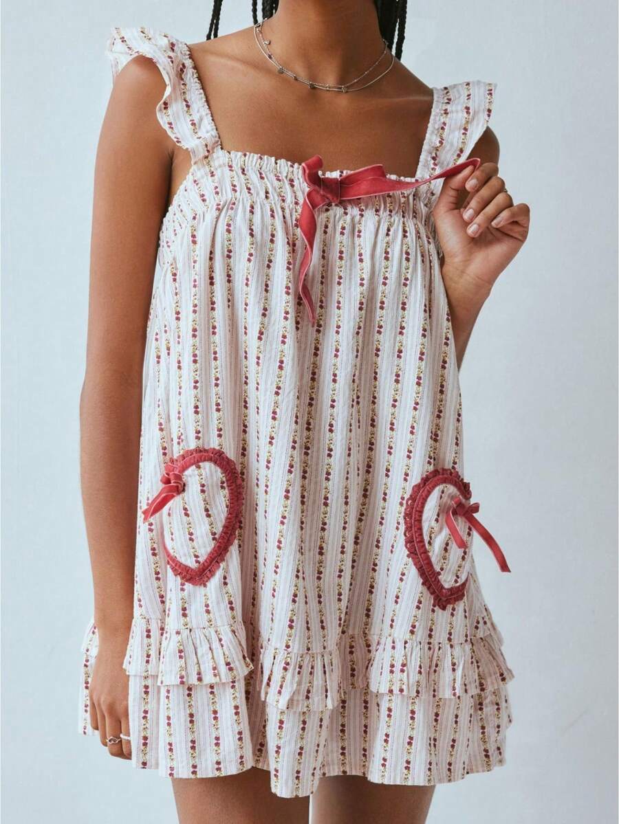 Vestido babydoll mini con lazo Y2K para mujer, tirantes finos, volantes, vestido fluido con tirante cruzado, estampado gráfico, vestidos para salir en vacaciones. - Rosa - Ver 1