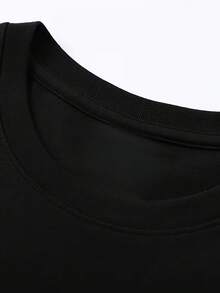 Diseño de fantasma blanco con expresión seria Camiseta oversize para mujer Ideal para Halloween y eventos temáticos Estilo casual para jóvenes 220g - Negro - Ver 2