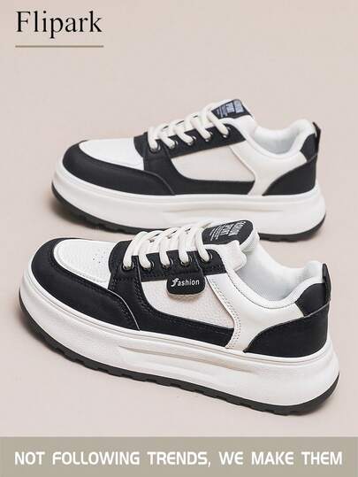 Flipark 1双黑白厚底休闲运动鞋 - 经典撞色设计 + 厚底，显著拉长腿部线条，通勤和日常穿着的理想之选，极其柔软舒适。