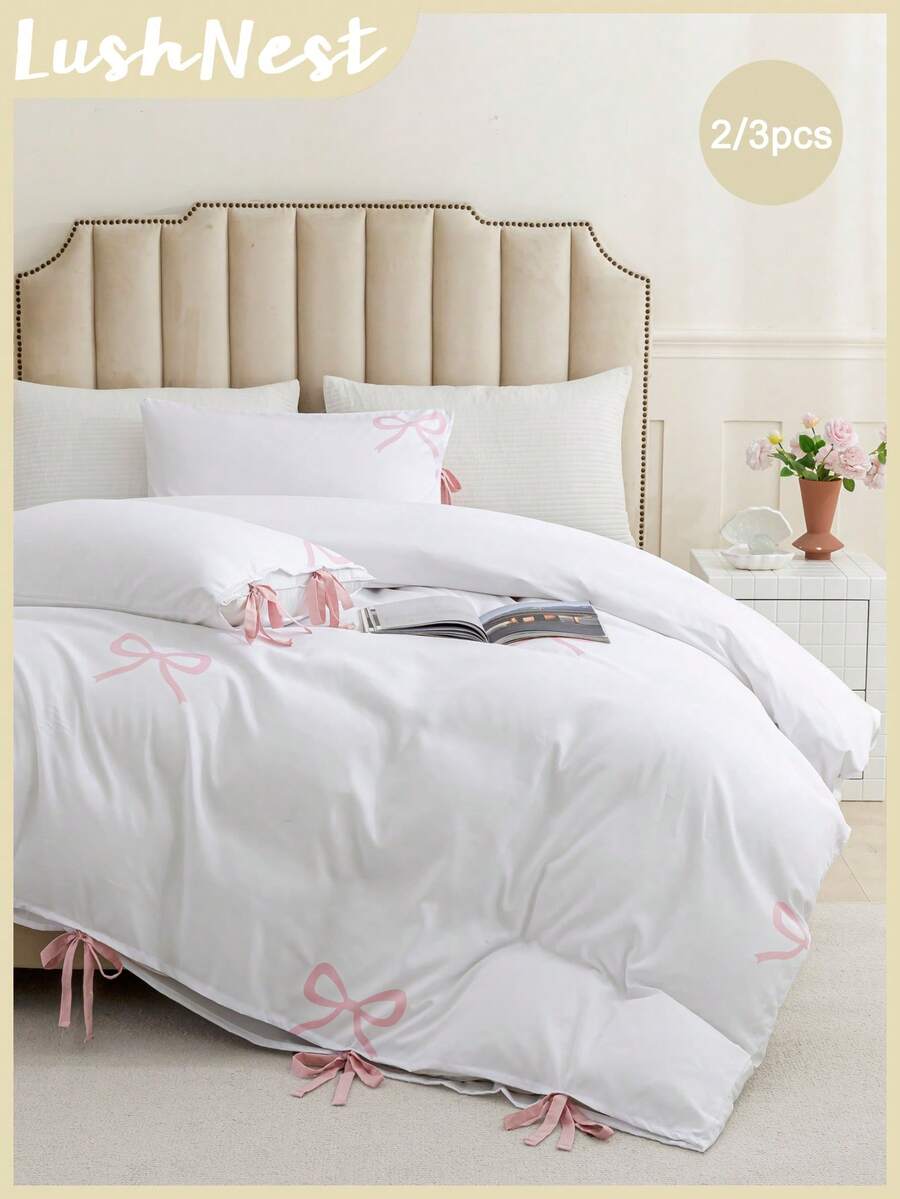 2件/3件粉色蝴蝶结图案床上用品套装（1个被套+2个枕套，不含被芯），采用优质涤纶面料，柔软亲肤，适合主卧、客房及其他卧室，四季皆宜，是理想的礼物。