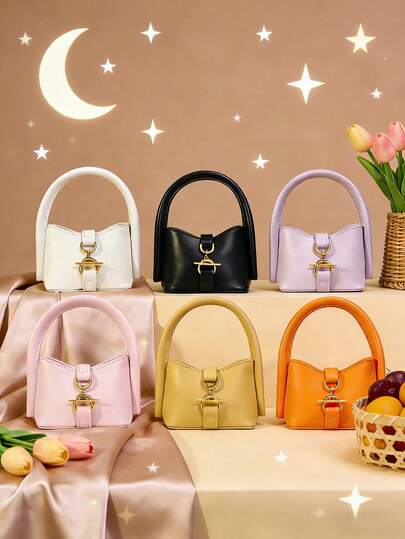 Este elegante y hermoso monedero/bolso de mano mini de estilo coreano es versátil y presenta un cierre con hebilla. Satisface las necesidades básicas de almacenamiento y viene en varios colores. Perfecto para adolescentes, es adecuado para viajes, como accesorio de moda o para uso diario. También es un regalo ideal para amigos en días festivos.