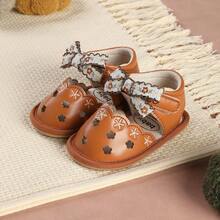 A Pair Of Baby Girl Shoes With Embroidered Bow And Hook And Loop Closure Design, Cute Floral Flat Sandals Suitable For Summer Bohemian Style, As A Gift At A Banquet Or Party - Brown - View 1