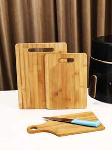 Un juego de tres tablas de cortar/platos con mangos, fabricados 100% en bambú y madera, disponibles en tres tamaños diferentes, a un precio especial. - Registro - Ver 2