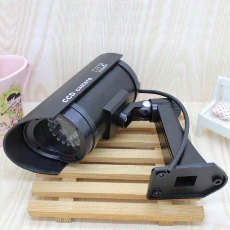 Cámara de Ficticia con Luz LED Intermitente - Simulación de Videovigilancia para Disuasión, a Pilas, Color Negro - Negro - Ver 1