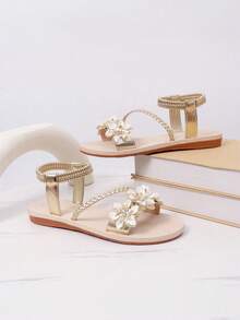 Sandalias planas de mujer con banda elástica con flores, remaches y cristales, de unicolor, para el verano. Sandalias de playa elegantes y versátiles para vacaciones. - Dorado - Ver 11
