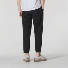 Pantalones casuales de pierna entallada para hombres Adidas, de uso dual para exteriores y transporte, pantalones cargo resistentes al viento y transpirables - Negro - Ver 4