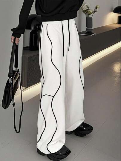 بنطلون رجالي كاجوال واسع الساق مع خصر مربوط بسحاب، تصميم لاصق متباين الألوان مقاسات كبيرة