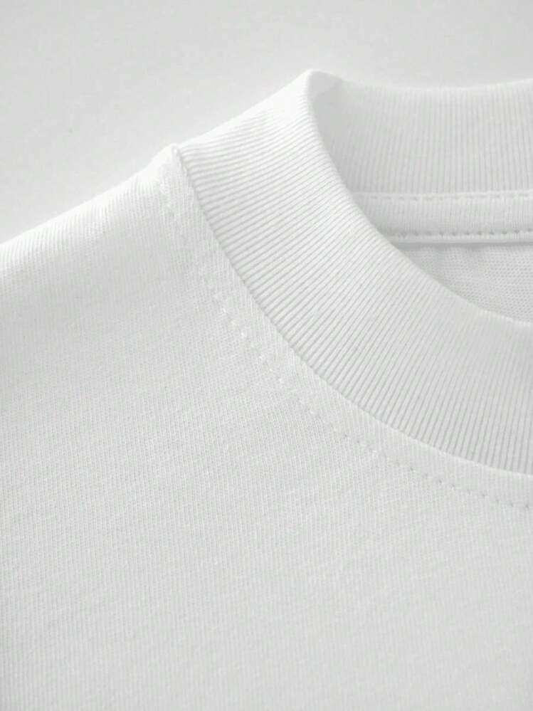 Texto de estilo romántico que refleja unión y complicidad con la palabra La Madrina en tipografía elegante transmitiendo un mensaje de cariño ideal para parejas que desean expresar su vínculo especial camiseta de hombre 100% algodón 220g - Blanco - Añade 6