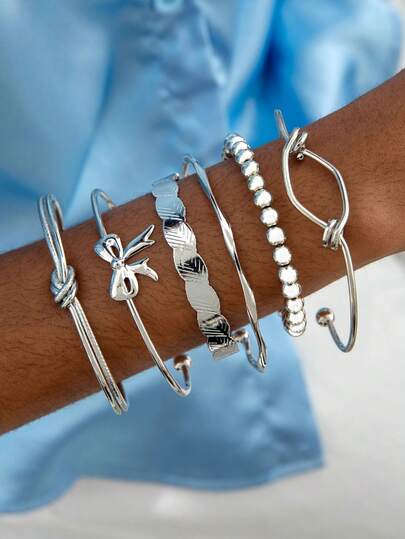Set de 6 piezas de pulsera de brazalete geométrico irregular liso y corbata de moño plateada
