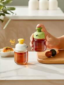 这款玻璃油瓶采用压力控制精准出油和调油功能，设计现代，适用于盛装酱油、醋和调味品。可重复使用的厨房油瓶，采用精准的压力控制出油技术，有绿色和白色两种颜色可选。厨房玻璃油醋瓶。 - 彩色 - 查看 6